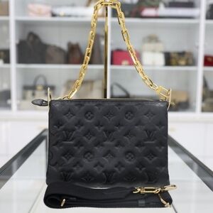 LOUIS VUITTON COUSSING PM HANDBAG